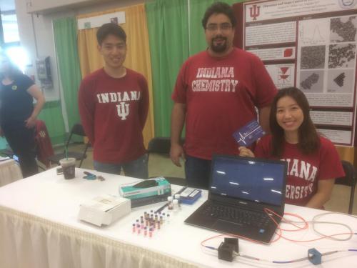 Ye group members posing with their presentation materials